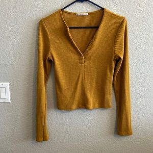 Got from goodwill, never worn by me. Orangish yellow